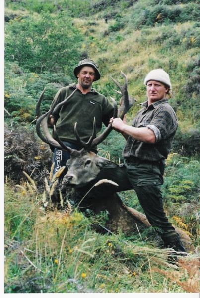 An old friend and our guide with 14 point Red Stag taken by friend South Island of New Zealand.